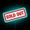 SOLD OUT neon sign with RGB lighting in blue.
