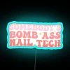 Nail technician working with colorful neon-lit nails in a humorous setting.