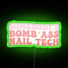 Nail technician in a humorous neon-lit setting with bold graphics.