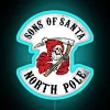 Bikers gathered around a colorful, neon-lit sign reading "Sons of Santa" in bold blue letters.