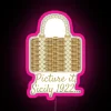 Pink neon sign with wicker purse design