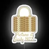 Sophia's wicker purse near neon sign