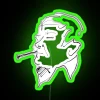 Neon sign with green letters reading 'Sophisticated Smoker'
