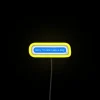 Neon sign with the phrase 'Sorry, I'm late, I saw a dog'