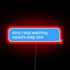 Neon sign with a pastel-colored logo reading 'Sorry I Was Watching RuPaul's Drag Race'