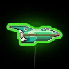 Galactic cargo ship with neon-lit exterior in deep space.