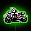 RGB LED neon sign with green background featuring a motorbike, speed, skill, cool helmet.