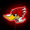 Neon sign of a speed thrush in RGB with red hue.