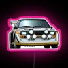 Neon pink sign reading 'Sport Quattro S1 E2 Rally Group B' with RGB lighting effects