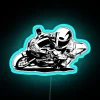 Motorcycle cornering technique demonstrated with neon-lit graphics.