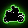 Neon-lit sport bike silhouette against a dark green background.