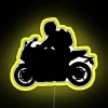 Neon-lit sport bike silhouette against a yellow background.