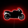Neon-lit sportbike silhouette against a dark background with bold red accents.
