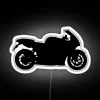 Neon-lit sport bike silhouette against a white background.