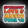 Neon sign reading 'Spread Love and Music Tour'