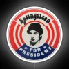 Rock legend Bruce Springsteen's name in bold, neon-lit letters on a presidential campaign sign.
