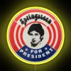 Neon sign reading 'Springsteen for President' in bold, colorful letters.