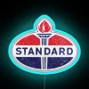 Vintage Standard Oil logo in neon lights, retro corporate branding