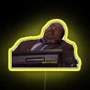 Neon sign featuring Stanley Hudson's logo in bright yellow.