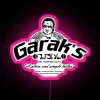 Deep Space Nine neon sign featuring Garak's tailor shop in Star Trek style.