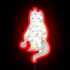 Neon unicorn cat sign with colorful, glowing letters spelling out 'Stay Weird With Love'