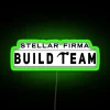 Neon sign with dark RGB and neon green accents, featuring a stylized logo of a build team from a science fiction universe.