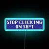 Neon sign with bold, blue lettering that reads 'Stop clicking on sh*t'