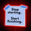 Neon sign with colorful stop, start, and finish words in bold letters.