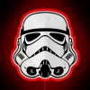 Stormtrooper in neon lights, Star Wars character illuminated at night.