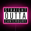 Neon sign reading 'Straight Out of Canterbury' in pink, RGB color scheme.