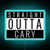 Neon sign with blue lights reading "Straight Outta Cary, North Carolina" in bold, colorful letters.