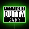 Neon sign reading 'Straight Outta Cary, North Carolina' in bold green letters.