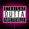 Neon sign in pink reading 'Straight Outta Fayetteville'