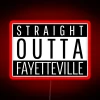 Neon sign reading 'Straight Outta Fayetteville' with colorful RGB lights.