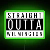 Neon sign reading 'Straight Outta Wilmington' in green letters, with a futuristic glow.