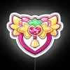 Neon sign featuring Tokyo Mew Mew's strawberry-bell logo in RGB colors, inspired by the Japanese franchise.