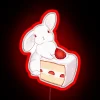 Neon sign with colorful neon lights forming a bunny silhouette, glowing in the dark.