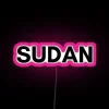 Sudanese cityscape with vibrant neon signs at night