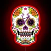 Neon sugar skull decoration with vibrant colors, symbolizing Mexican Day of the Dead celebrations.