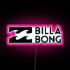Billabong neon-colored short sleeve shirt in pink, a summer adventure outfit.