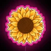 Colorful yarn wrapped around a sunflower with neon pink accents.