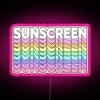 Neon pink sunscreen sign with vibrant RGB colors.