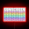 Neon sign with neon sunscreen logo in red color