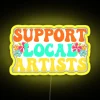 Neon sign promoting local music artists, colorful and eye-catching design.