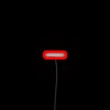 Neon sign reading 'Support Local Bands' in small, black font.