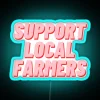 Supporting local farmers with vibrant neon signs.