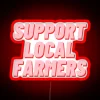 Neon sign reading 'Support Local Farmers' in bold, colorful letters.