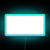 Vibrant neon sign promoting local music with bold, colorful graphics.