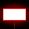 Neon sign reading 'Support Local Music' in bold, colorful letters against a dark background.
