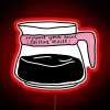 Neon sign with colorful design promoting local coffee shop.